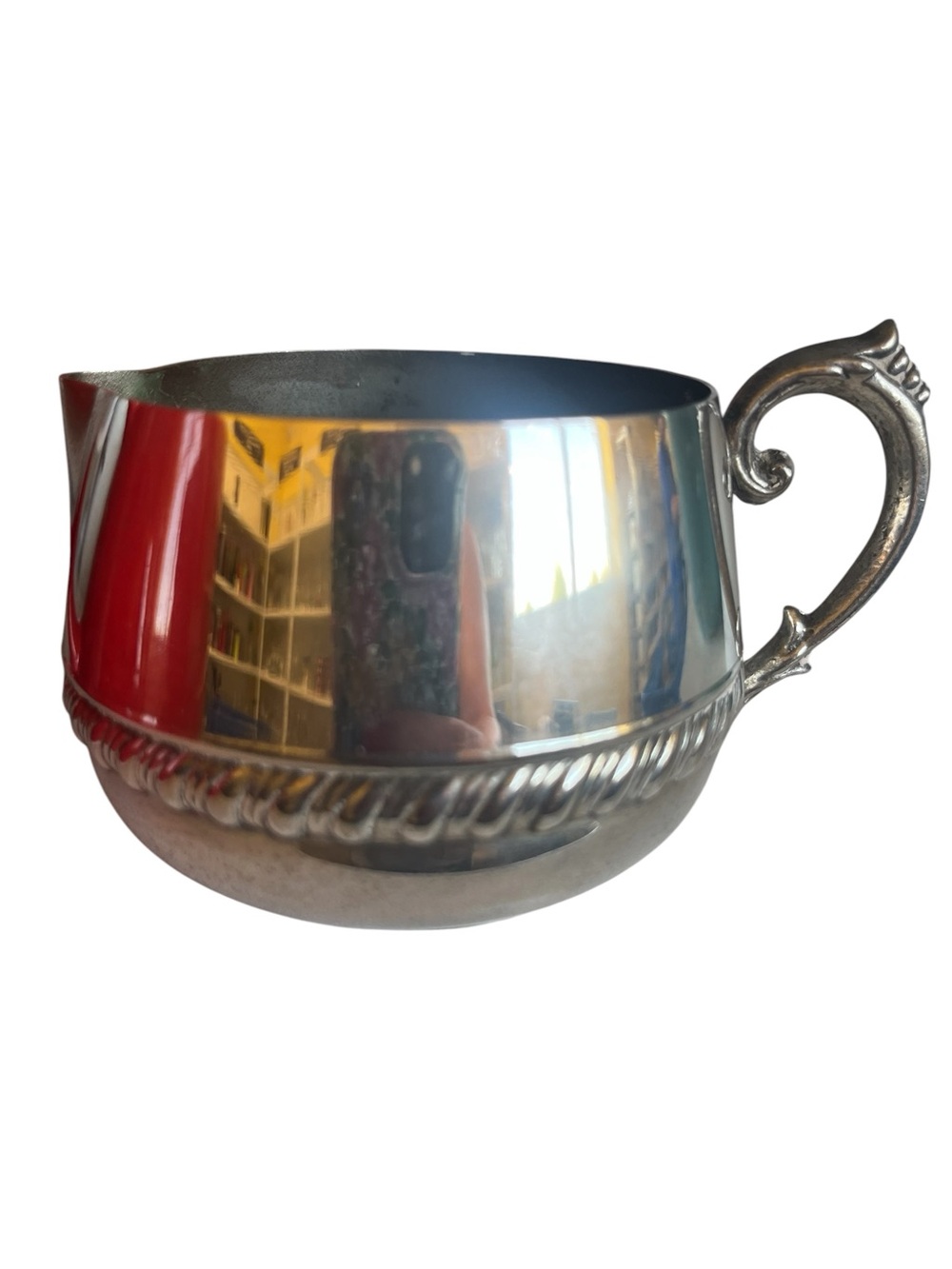 Vintage Irvinware creamer has a polished chrome mirror finish and a rope design